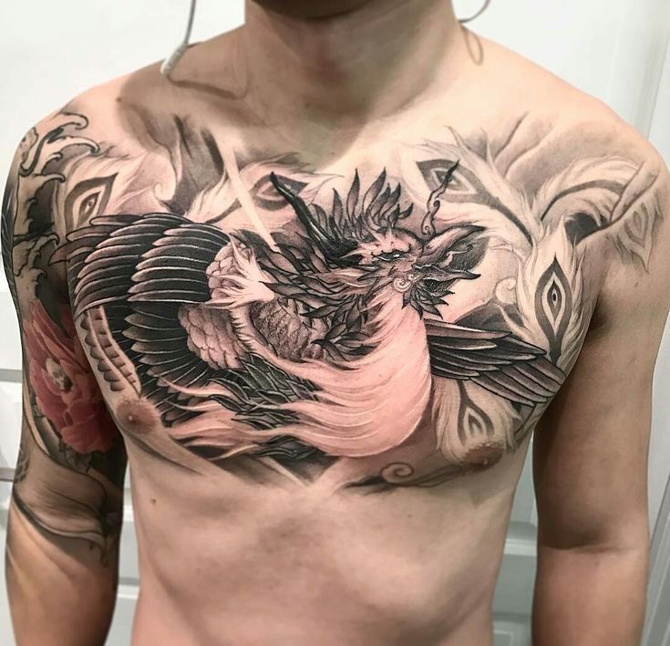 mẫu tattoo nghệ thuật trên ngực