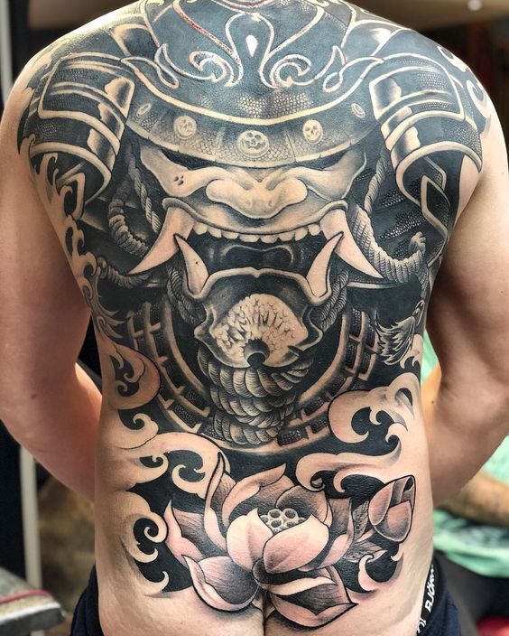 tattoo mặt quỷ kết hợp hoa sen