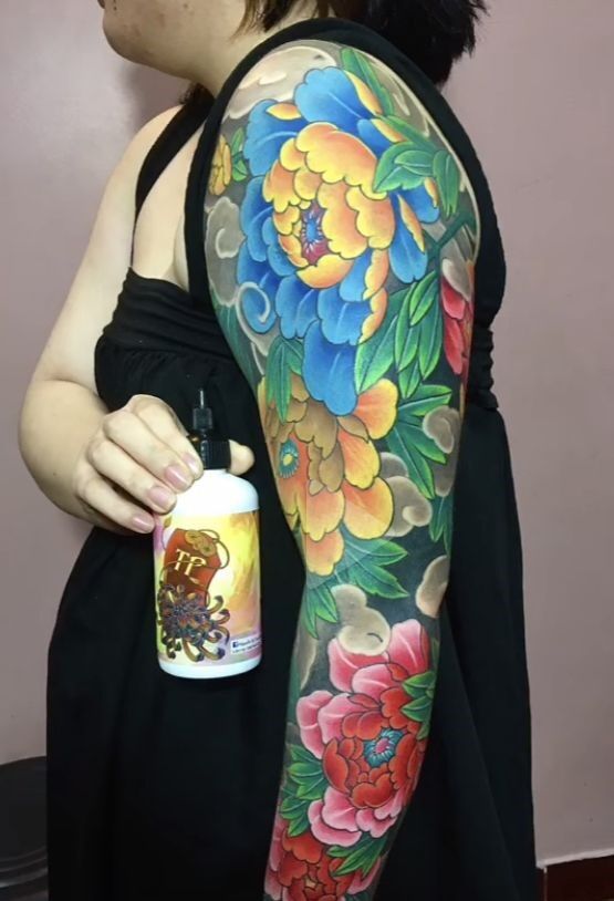 mẫu tattoo hoa mẫu đơn bít kín tay