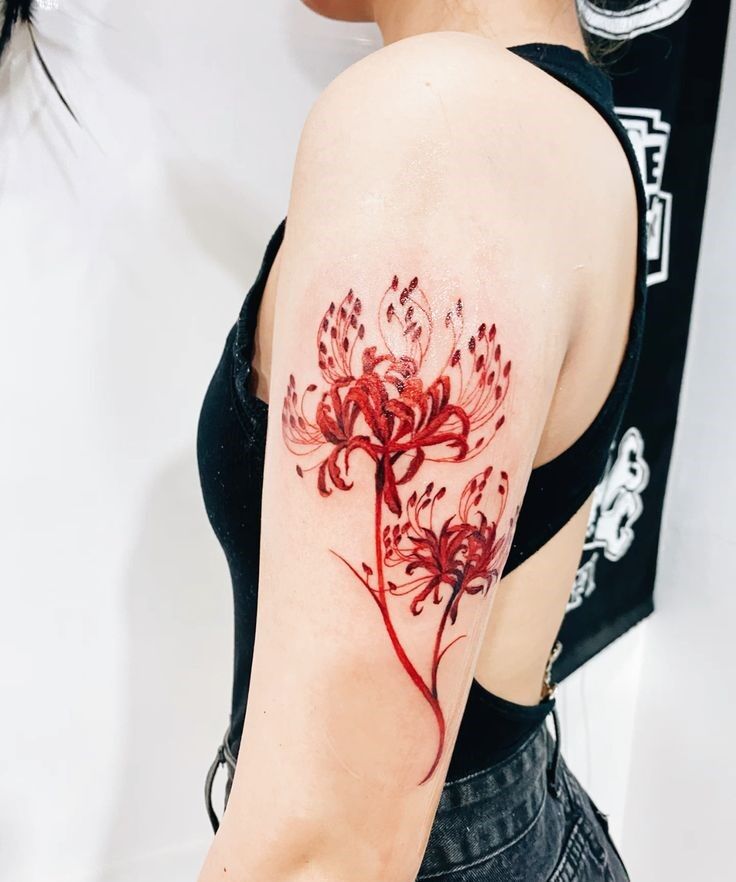 Tattoo hoa bỉ ngạn độc đáo ở tay