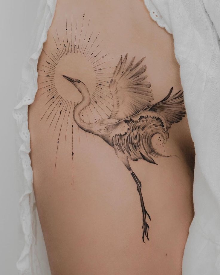 mẫu tattoo con cái hạc ý nghĩa