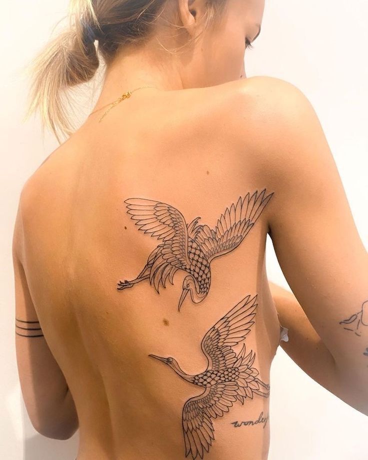 tattoo con cái hạc ở mặt mày sống lưng rất rất chất