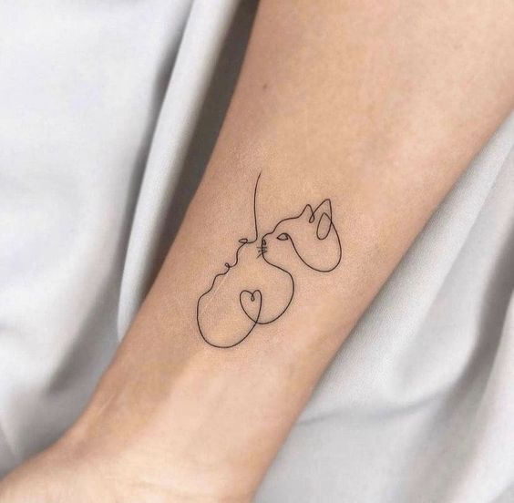 mẫu tattoo cực sáng tạo cho khách yêu mèo