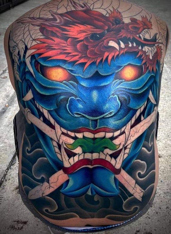 tattoo mặt quỷ dạ xoa kết hợp rồng đỏ kín lưng