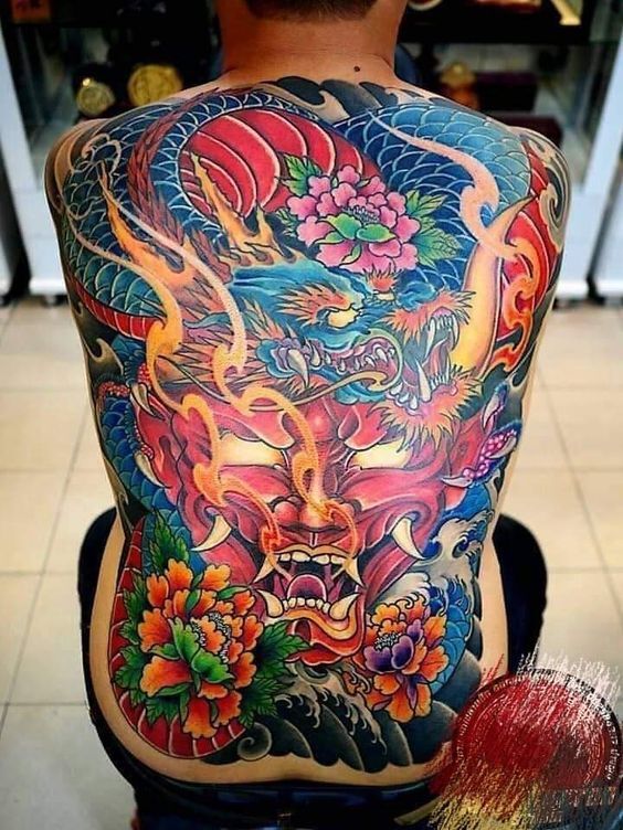 tattoo mặt quỷ kết hợp với rồng bít lưng cho khách