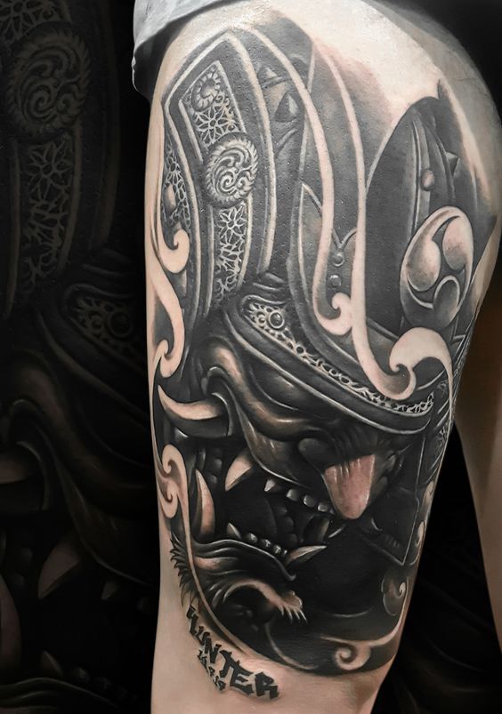 tattoo mặt quỷ samurai đen độc lạ ở đùi