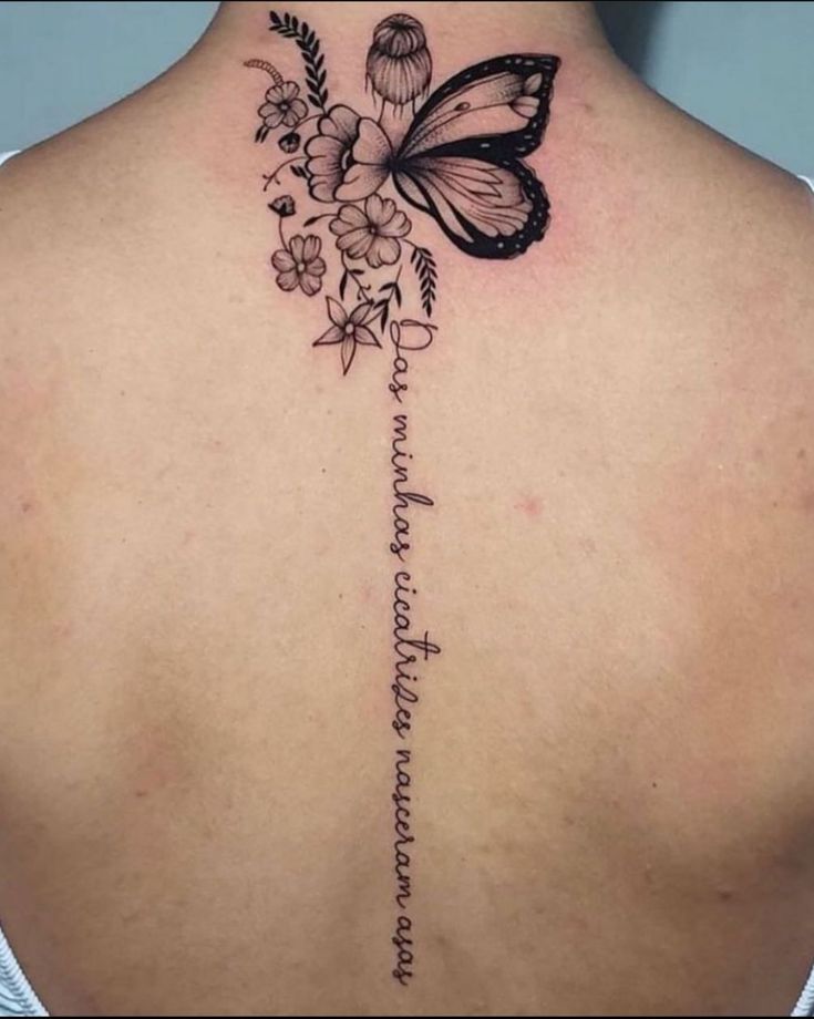 tattoo cánh bướm sau gáy kéo xuống lưng