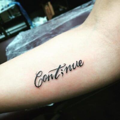 hình tattoo cẳng tay mẫu chữ continue